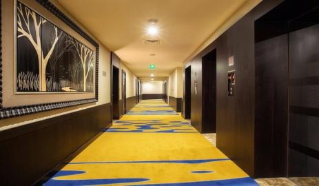 Ghaya Grand Hotel patterned corridor