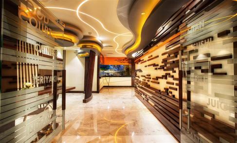 Ghaya Grand Hotel wayfinding corridor