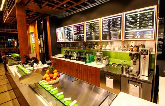 Liquid Nutrition juice bar counter with fresh fruit styling
