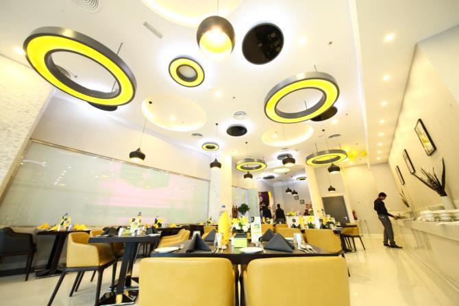 Ruchi Restaurant dining hall with sculptural pendant lighting