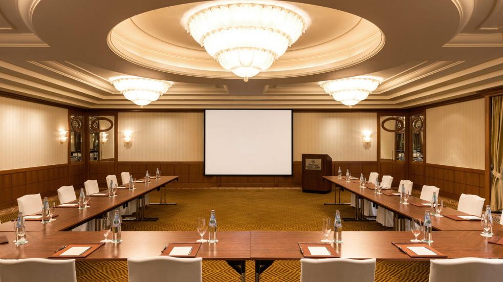 Fully coordinated hotel boardroom set up for a meeting