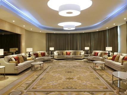 Symmetrical curved majlis seating layout